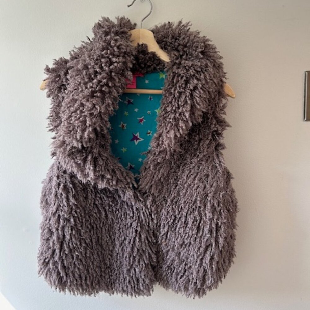 Betsey Johnson.  Faux Mongolian fur vest